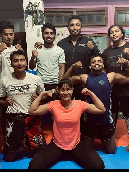Another photo from the balcony days. The team was smaller, but the dream was just as big.
