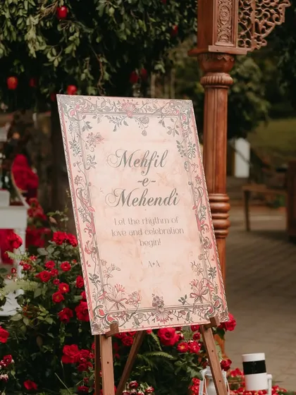The welcome signage for the "Mehfil-e-Mehendi," featuring beautiful calligraphy and traditional motifs that set the tone for a soulful evening of celebration.