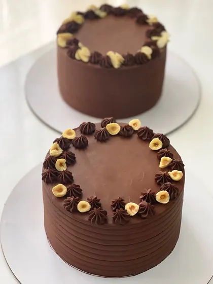 For the ultimate chocolate lover, two of my signature chocolate hazelnut cakes, ready for delivery.