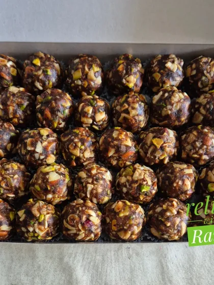 A single box of my Dry Fruit Laddoos, showcasing the natural sweetness and crunch that makes them a favorite. They are made fresh for every order.