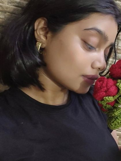 Me and my flowers which will never die. I love taking a moment to just appreciate the things I've created, like this beautiful bouquet of red roses.