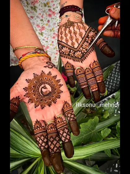 Here are two distinct styles, both achievable with the right techniques. On the left, a peacock mandala with a beautiful stain, and on the right, a more traditional design with fine details, perfect for any celebration.