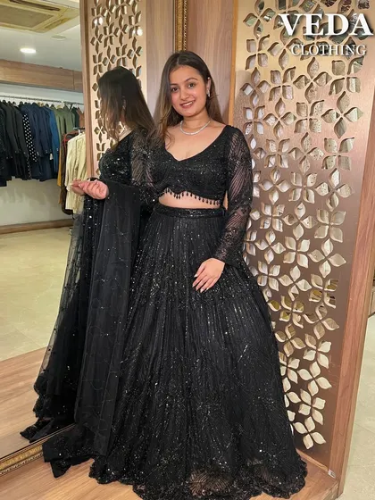 Make a statement at your next cocktail party or reception with this glamorous black sequin lehenga. It’s one of my most popular party wear rentals, perfect for turning heads without the high cost.