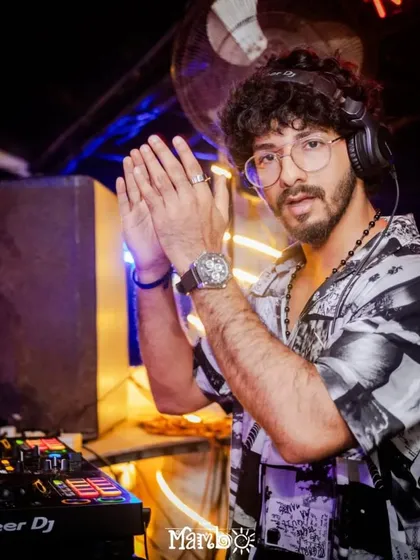 A moment of gratitude at the end of a great set at Cafe Mambo. The energy from the crowd is what fuels my performance.