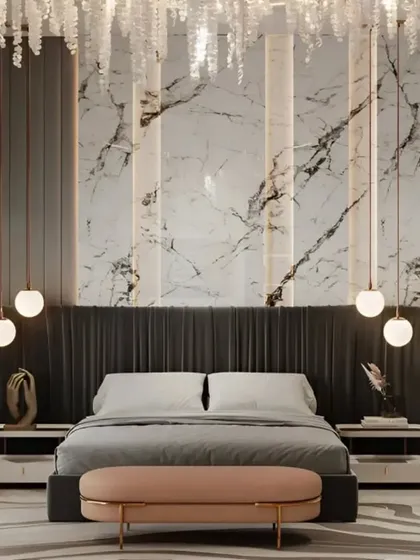 For this master bedroom, we aimed for pure luxury and comfort. The design features a dramatic floor-to-ceiling marble accent wall, a custom upholstered headboard, and elegant pendant lighting, creating a sophisticated and tranquil atmosphere.