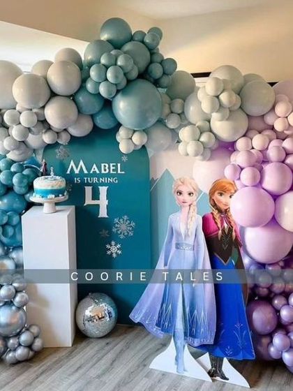 Let it go and step into a winter wonderland with our Frozen-themed party. This magical setup features Elsa and Anna, with a balloon arch in icy blues, purples, and silver to create the enchanting world of Arendelle.