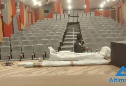 Our team is seen here during the installation phase on the main stage. We were responsible for everything, including the setup of large-format speakers and the careful unpacking and placement of sensitive AV equipment.