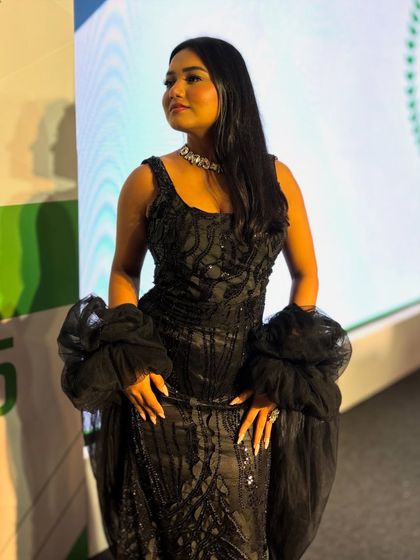 A profile shot in my black gown, ready for the evening's festivities.