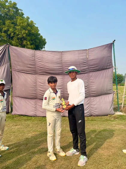The Best Bowler of the match, Rounak, with his trophy.
