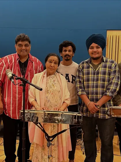 A blessed moment in the studio with the queen of melody, Asha Bhosle ji. To be in the presence of such a legend and witness her timeless artistry is an honor I will always cherish.