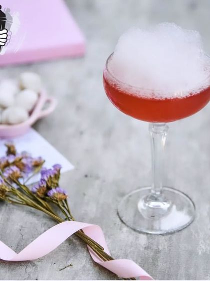 A dreamy pink cocktail topped with an airy foam cloud. Our team of expert mixologists can create the perfect menu for your guests.