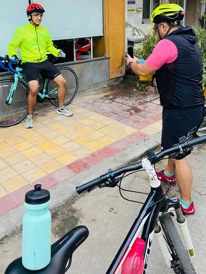 A father-son moment, with the father taking a picture of his son. Capturing memories is a big part of our club culture.