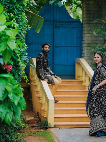 A quiet moment on a staircase with a bright blue door, part of our colorful and unique sets.