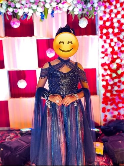 The cold-shoulder design and colourful sequins make this outfit a fun and festive choice for any celebration.