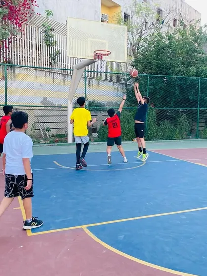 A player shoots a jump shot. We work on creating and making these shots consistently.