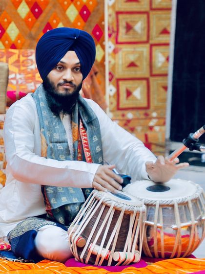 A candid shot from the Delhi performance, ready for the next composition.