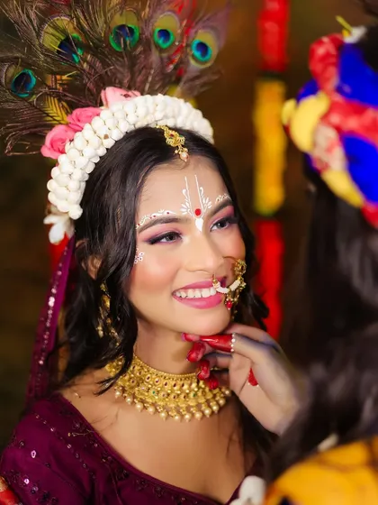 A beautiful, candid-style shot of Radha, capturing a moment of joy.