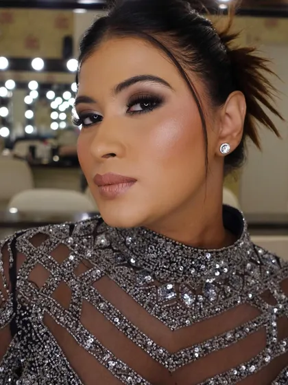 Another close-up in different lighting, showing how the smokey eye and contoured skin look flawless and camera-ready.