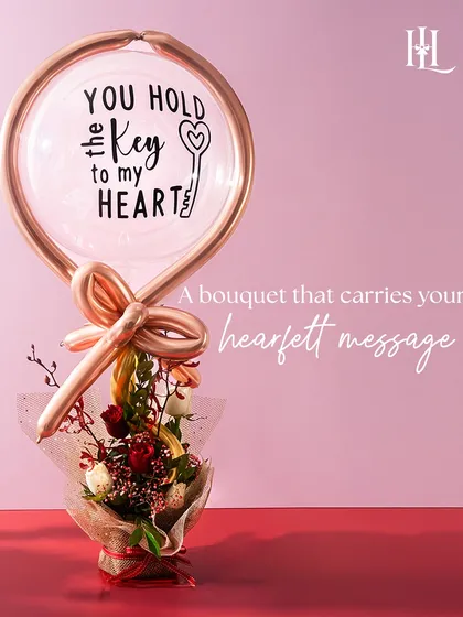 This bouquet carries a heartfelt message. The "You Hold the Key to my Heart" balloon paired with a beautiful floral arrangement is a sweet and direct way to show your love this Valentine's Day.