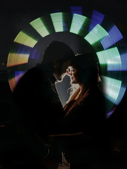 We love getting creative after the sun goes down. This light painting portrait is an example of how we use artistic techniques to create a truly unique and magical image that sets your pre-wedding shoot apart.