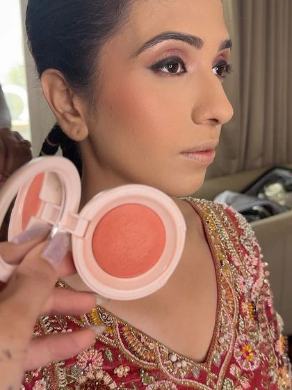 A close-up showing the fresh, peachy blush I used for this look. Cream and powder blushes can be layered to create a natural, long-lasting flush of color.