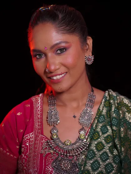 A close-up of the Navratri glam, showing the bright eye makeup and flawless base.