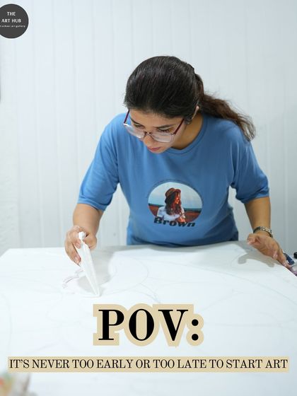 This image captures the intense focus of a student laying down the foundational lines of a large new piece. Every great artwork starts with a single mark.