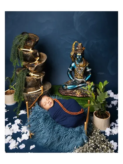Your story is unique, and your photos should be too. This custom newborn session, themed around Lord Shiva, shows how I can weave your personal beliefs and passions into a one-of-a-kind portrait for your baby.