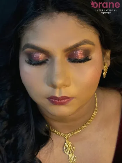 This shot with eyes closed gives a great view of the sparkling eyeshadow and dramatic lashes.
