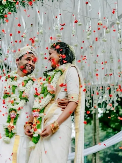 It's the pure, unfiltered joy we aim to create. This moment, with a couple showered in petals under a minimal floral mandap, captures the soul of our work: creating beautiful spaces where real emotions can unfold.