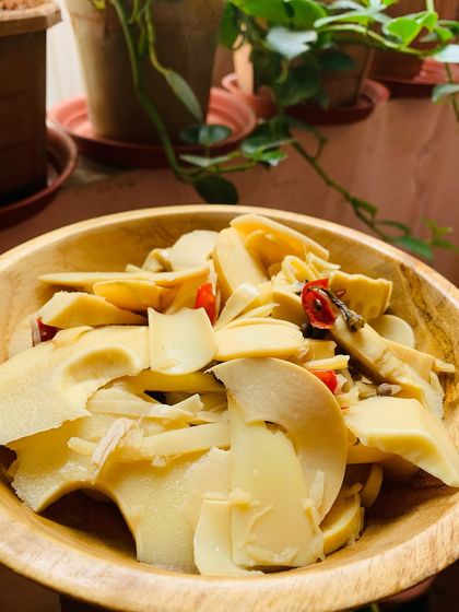 Another shot of the fresh bamboo shoots in a wooden bowl. The simplicity of the ingredient is what makes it so special.