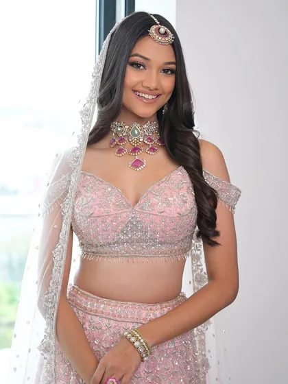 A happy bride is the most beautiful bride. This look is all about fresh, glowing skin and a bright smile, proving that minimalist makeup can have the maximum impact.