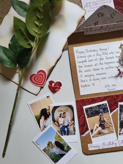 A simple and sweet birthday card with a handwritten message, surrounded by polaroids. It’s a heartfelt and personal gift.