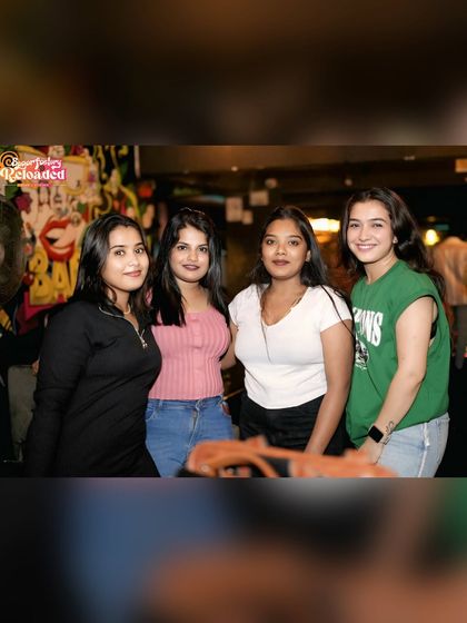 Guests posing for a photo at Sugar Factory. It's not just about the dancing, it's about the whole social experience.