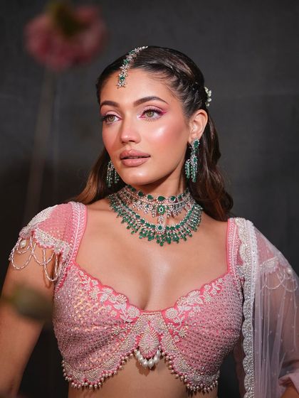 A stunning portrait. The pink liner makes her green eyes pop beautifully.