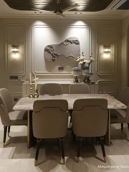 The dining area is the heart of many homes. For this space, we designed a bespoke dining table with a specially sourced Italian marble top. The chairs are fabricated with a practical leatherette front and a beautiful weave texture at the back, combining easy maintenance with elegant design.
