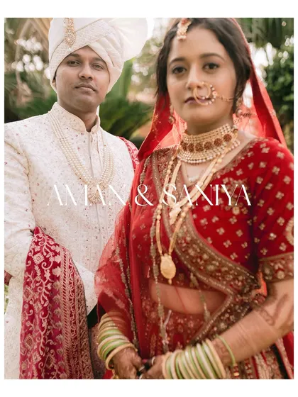 A formal portrait of Aman and Saniya, styled like a classic wedding announcement. Their traditional red attire and direct gaze give the image a regal and timeless quality.