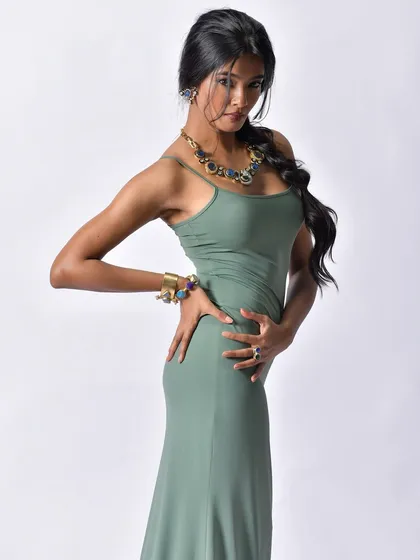 A strong, fashion-forward stance. This image is all about confidence and is perfect for a campaign's lead shot.