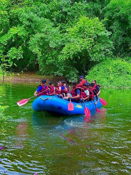Young campers enjoy a calm rafting session on the Shivpura Backwaters. We offer experiences suitable for all age groups and skill levels.