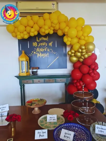 Executing a detailed theme is my passion. For this Harry Potter party, I created a magical atmosphere with a "Lumos" backdrop, a balloon arch in house colors, and themed food labels to transport the guests right into the wizarding world.