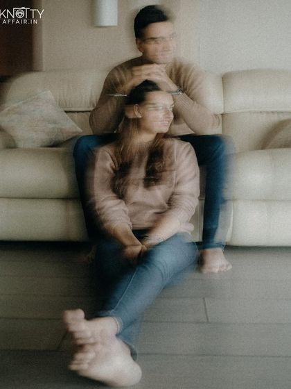 An artistic shot using slow shutter speed to create a motion blur effect. This technique captures the feeling of time flying by and the whirlwind of emotions before the wedding.