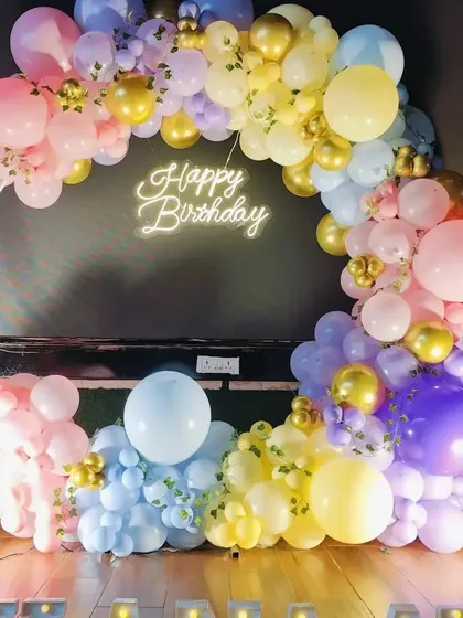 A full view of the pastel rainbow balloon ring, a perfect backdrop for photos.