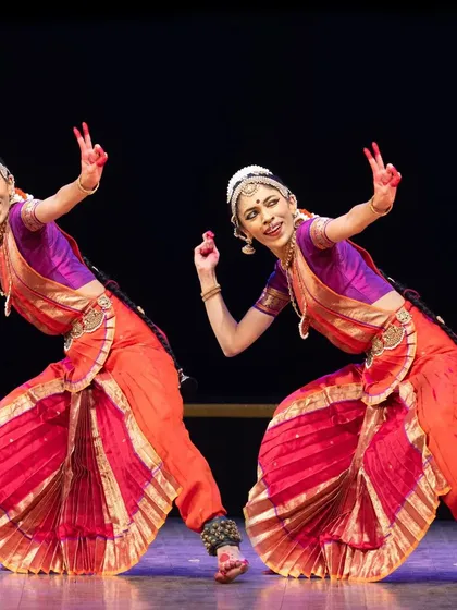 The energy of a group performance is electric. This image captures the 'maja' of playing a gopa, showcasing the synchronized and dynamic movements I choreograph for group productions. Whether for a solo artist or an ensemble, I aim to create a powerful visual narrative.