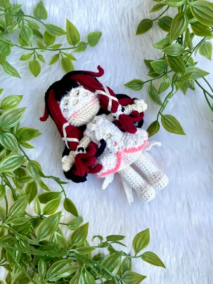 This is Columbina Damselette, a beautifully detailed anime character. The intricate hairstyle with red and black locks and the delicate white dress was a challenge I truly enjoyed creating.