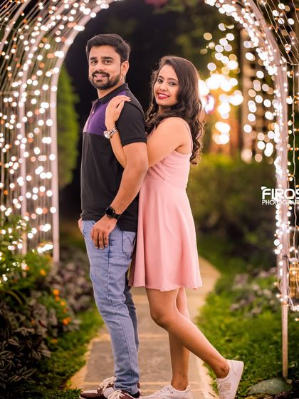 A classic pose in the light tunnel, perfect for capturing the joy and romance of a couple's journey.