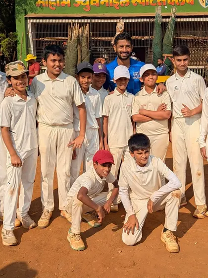 Another shot of Rahul Tripathi with our junior team. He is a true role model, always willing to give back to the next generation.