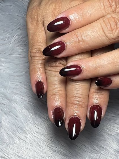 The finished look of the elegant burgundy-to-black ombre nails. This is such a sophisticated and chic color combination.