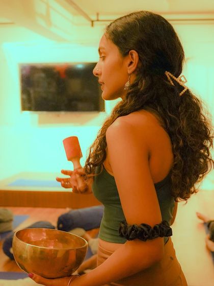 Here I am during a workshop, explaining the process of Yoga Nidra and sound healing. I believe rest is not a luxury but a necessity for our well-being, and I am passionate about sharing these powerful, restorative tools.