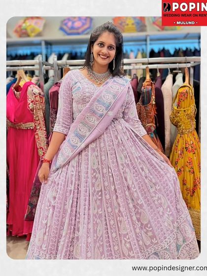 This beautiful lavender lehenga offers a soft and romantic bridal option. The all-over embroidery provides a rich texture, perfect for a day wedding or reception.