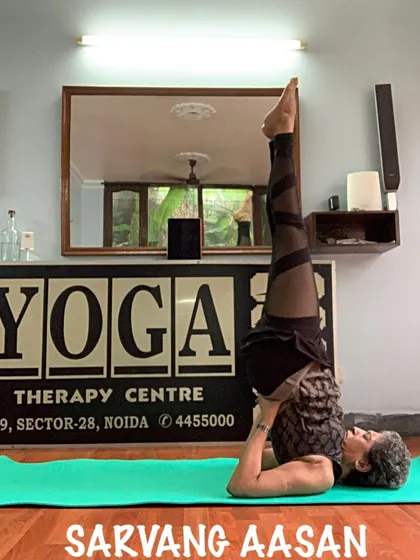 Sarvangasana, or shoulder stand. This inversion benefits the entire body and is a cornerstone of a complete yoga practice.